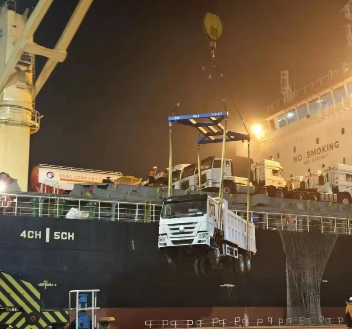 HOWO truck craned onto the vessel at the port