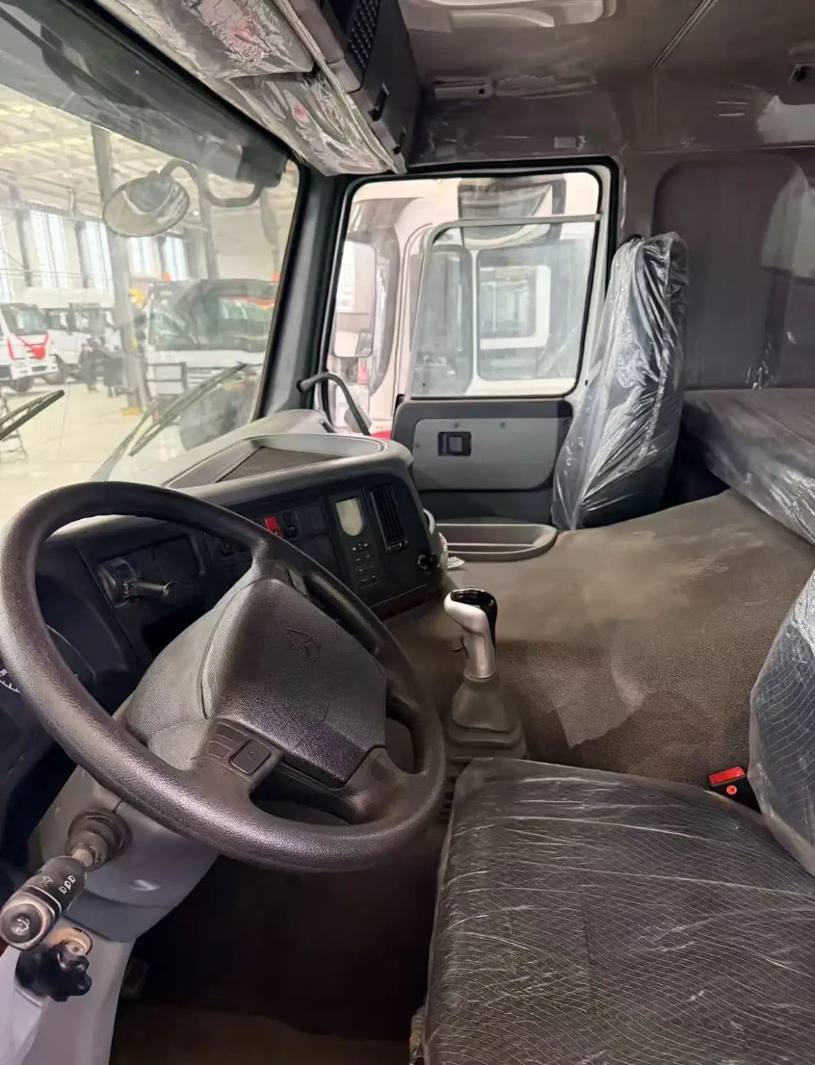 HW76 cab interior of the used HOWO 6x4 dump truck